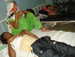 Torture victim Nijammudin on hospital bed